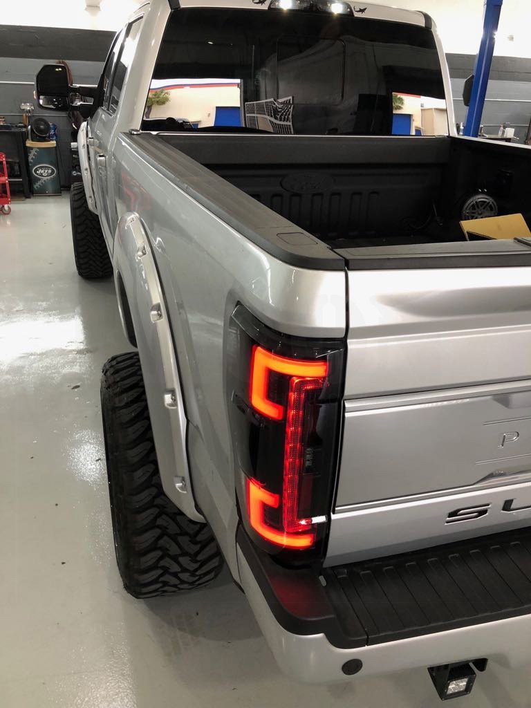 Ford Super Duty 17-19 Tail Lights OLED in Dark Red Smoked