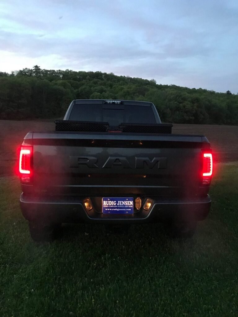 Dodge RAM 1500/2500/3500 13-18 Tail Lights OLED in Smoked