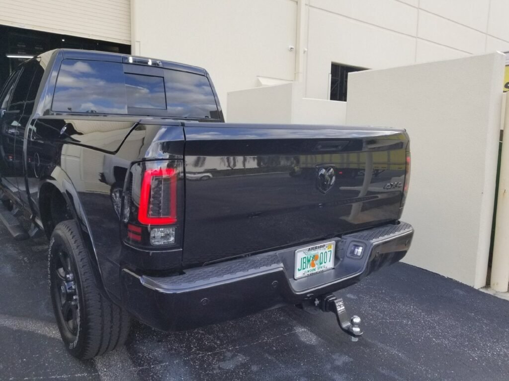 Dodge RAM 1500/2500/3500 13-18 Tail Lights OLED in Smoked