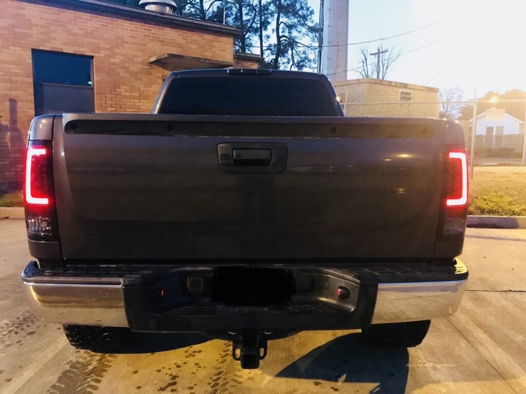 GMC Sierra 07-13 Tail Lights OLED in Dark Red Smoked